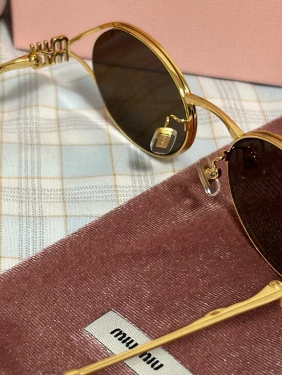 Miu Miu Oval Gold Frame Sunglasses